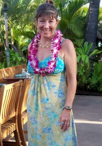 Marisa in lei and hawaiin dress