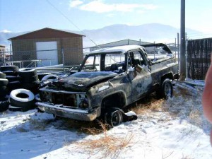 Burned out blazer with mountains in distance