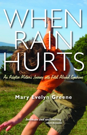 cover of when rain hurts boy in grass spinning around underneath clear blue sky