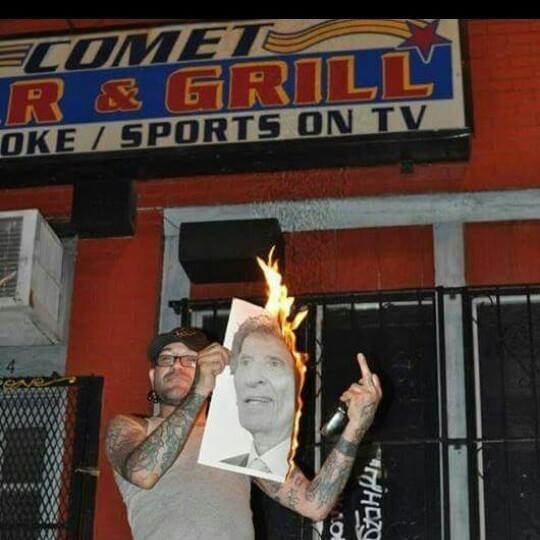mazur burning image in front of comet bar in detroit