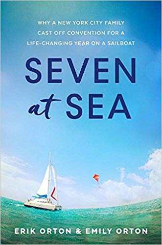 Seven at sea cover sailboat in oecan with big sky