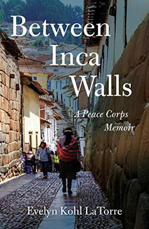 Book cover of between inca walls shows a picture of people walking on a street in peru