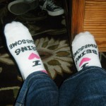 donna talarico's feet wearing socks that say I heart being awesome