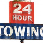 24-hour towing sign
