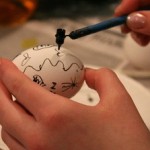 Ukrainian egg being painted with wax