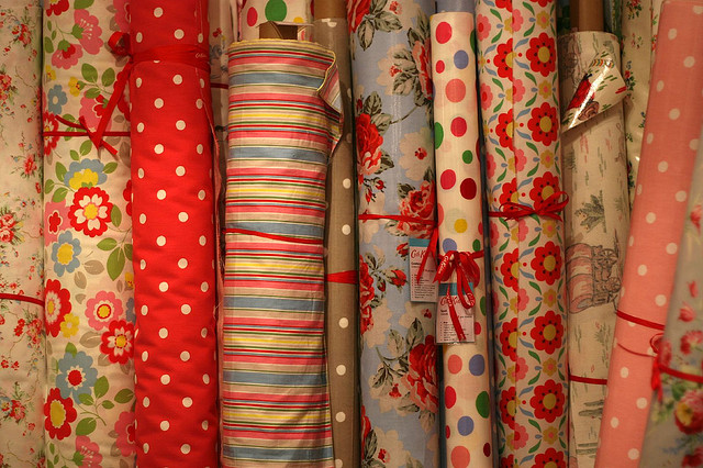 different, retro patterns of fabric rolls