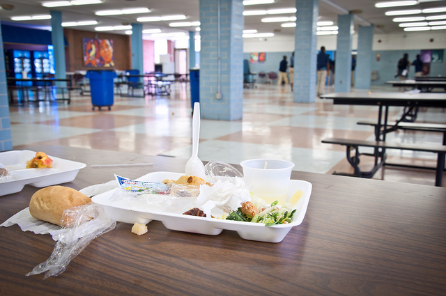 uneaten food on school lunch tray