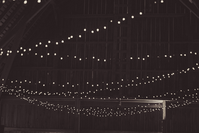 white christmas lights on a barn