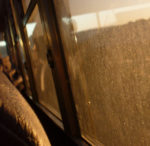 close up of school bus window looking out - dirty