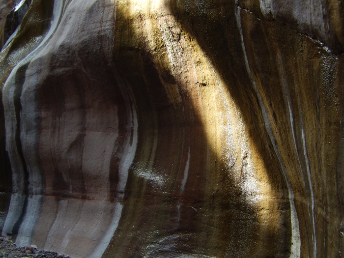 close up of rock formation with glint of sunshine