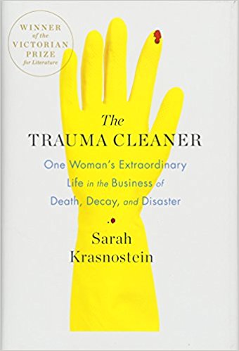 the trauma cleaner cover, rubber dish glove with speck of blood on finger