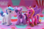 three My Little Pony toys - one has wings