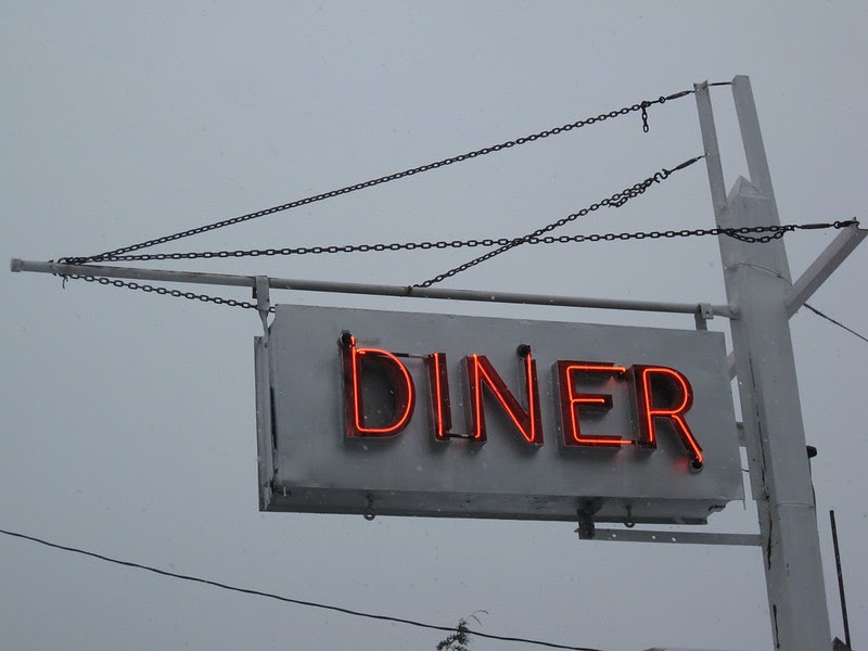 neon diner sign in winter
