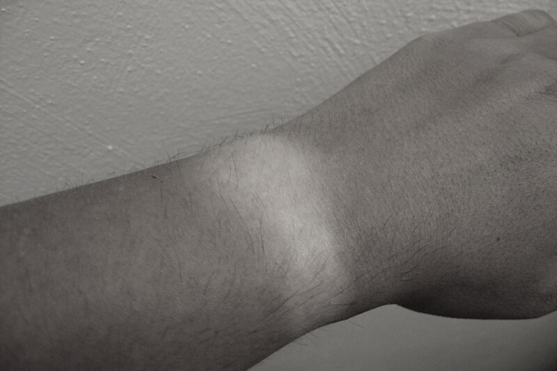wrist showing tan line from watch