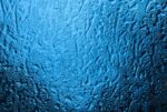 macro shot of frozen blue ice