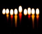 nine candles burning