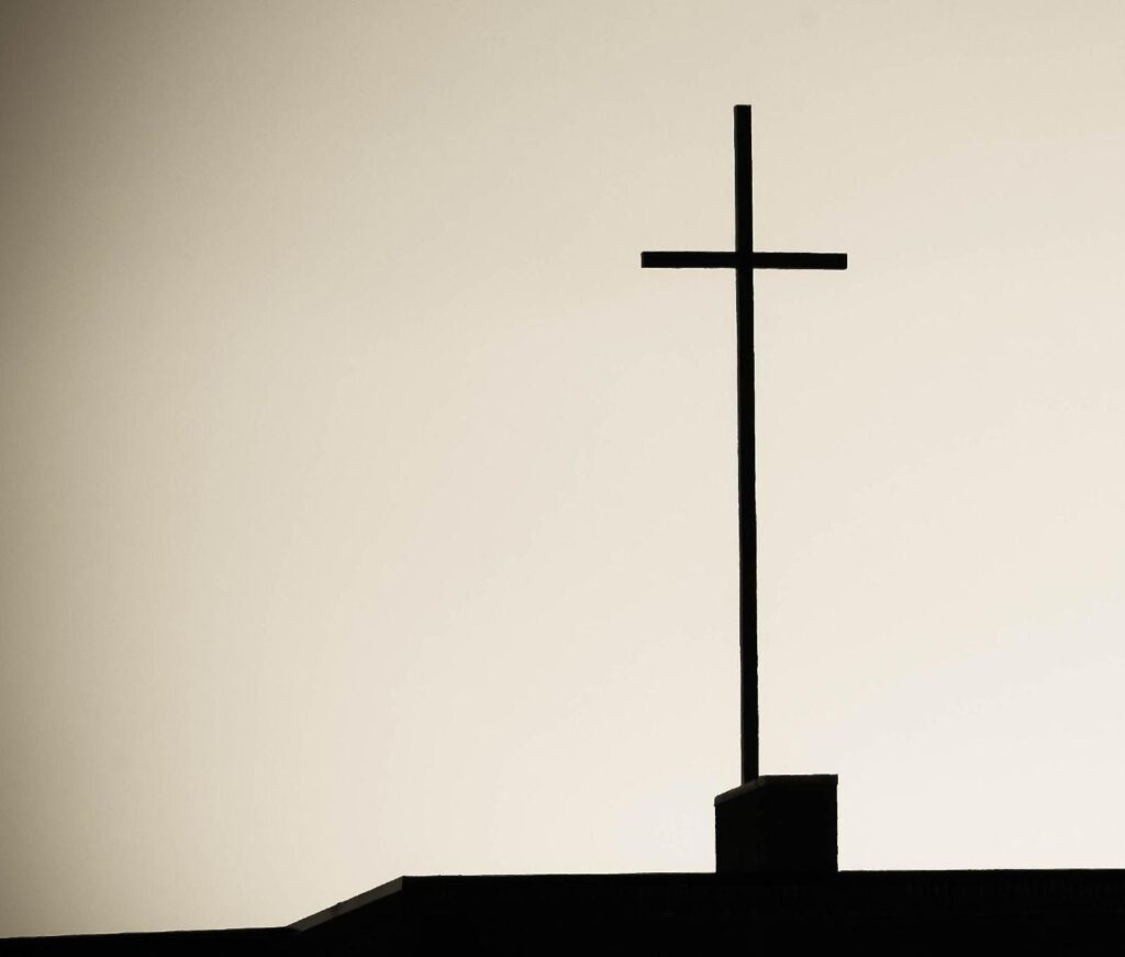 cross atop a building from a distance