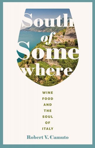 A view of the Italian coast is seen through a wineglass on the book cover of South of Somewhere