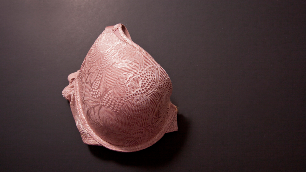 Pink bra folded showing one cup