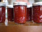 Ball jars of homemade canned tomato sauce