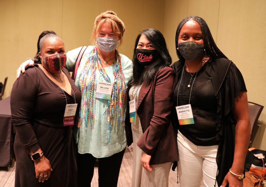 Four women new friends posed at hippocamp wearing masks