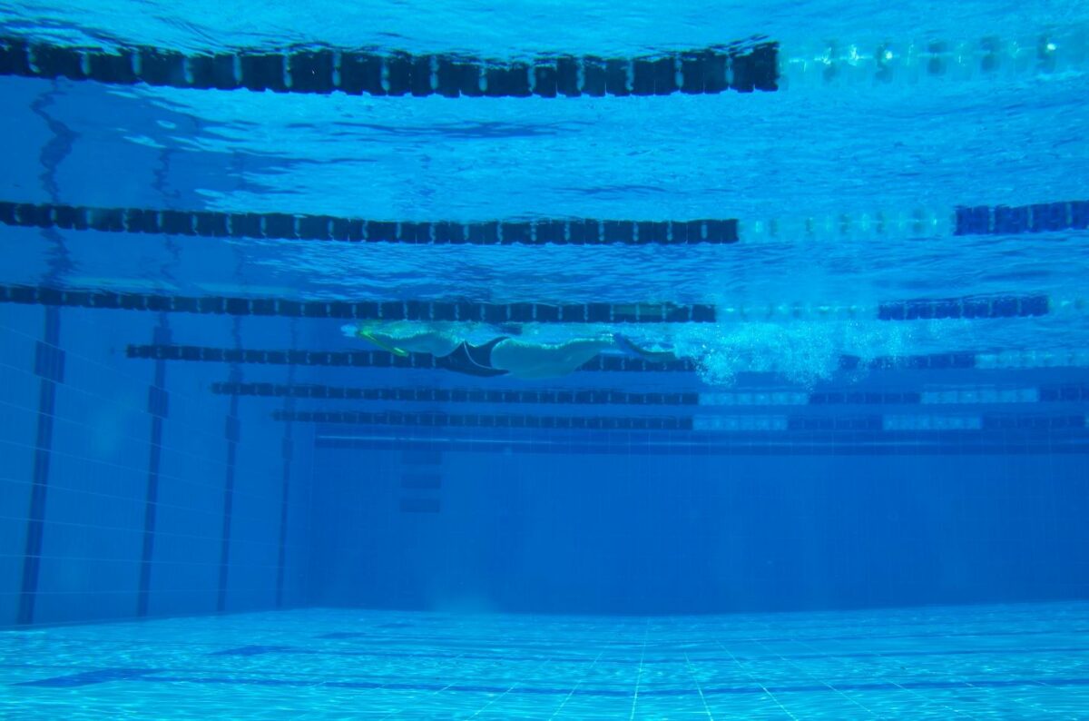 underwater in a pool with floating lane markers