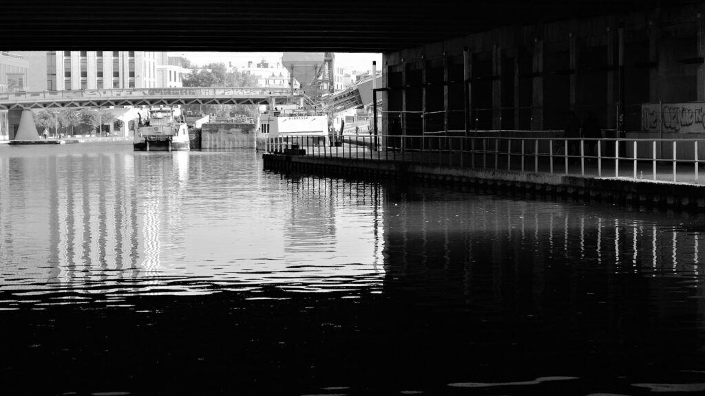 under a bridge of a city canal