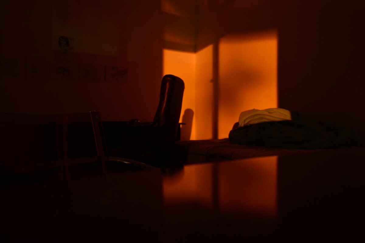 dark bedroom - desk chair off in the distance