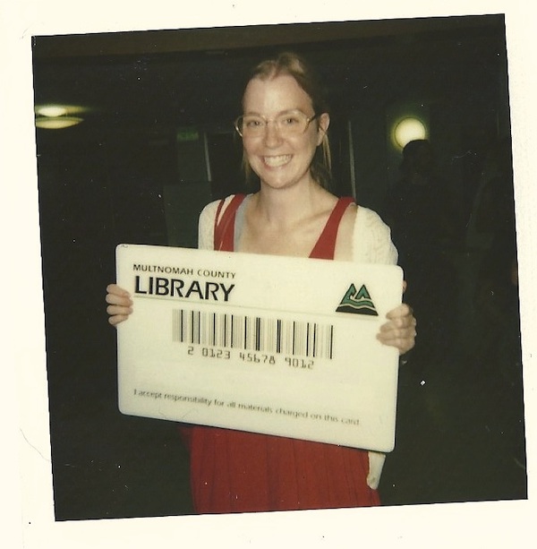 Katie haegele with giant library card