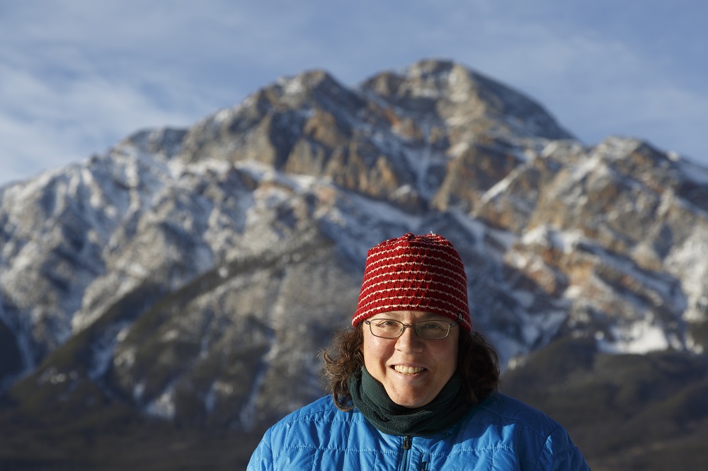 Sarah Boon in front of a mountain
