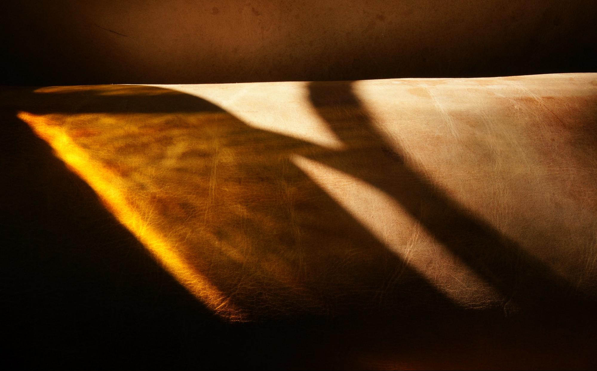 close up of leather sofa with shadow